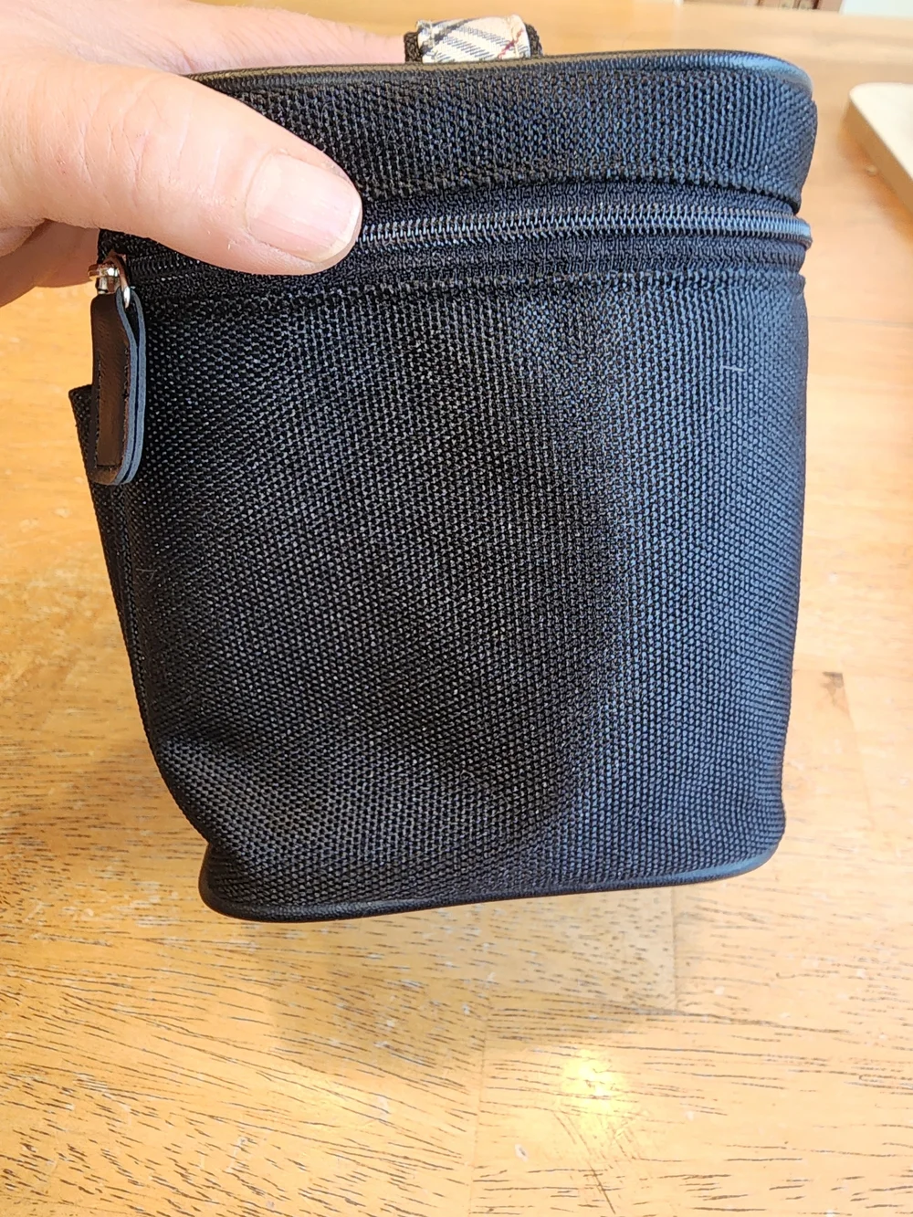 black Burberry vanity Nylon pouch and features a branded metal plate & Novacheck